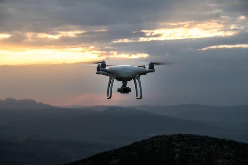 drone flying over dark skies