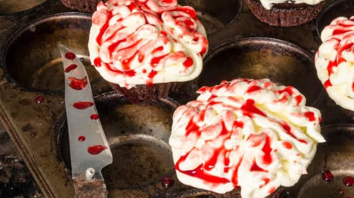 zombie brain inspired cupcakes with a knife in a cupcake pan