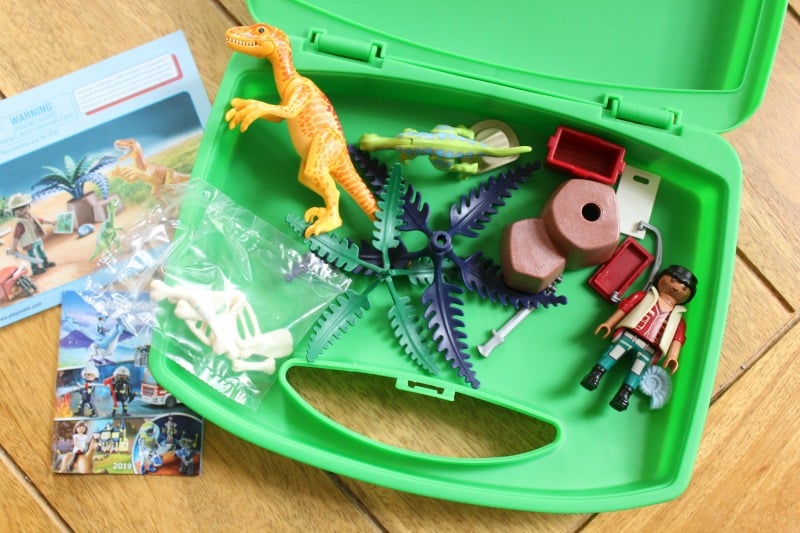 dinosaur toy in travel case