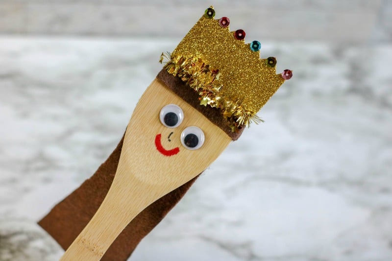 a puppet made out of a wooden spoon
