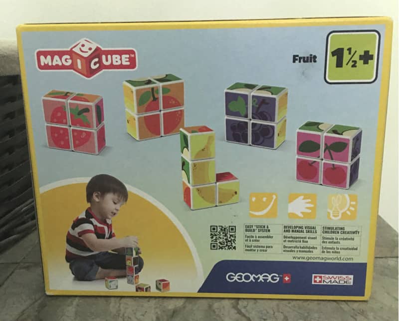a package of blocks with brightly colored fruit designs