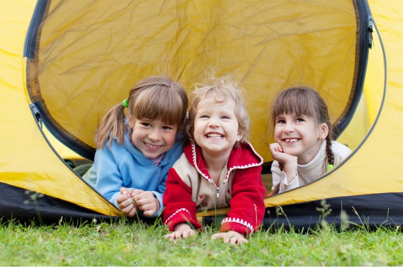 happy children in a tent