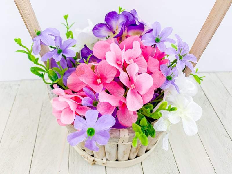Easter flower baskets filled with spring flowers