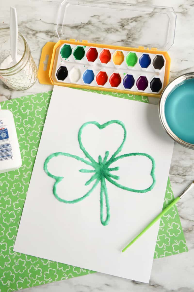 Are you looking for an easy shamrock craft for the kids to do? Learn more about adding salt to paint with this easy craft project for kids.