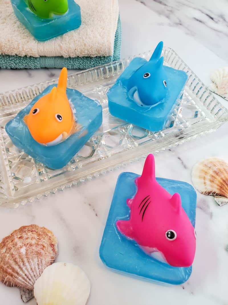 Kids love playing with toys and they also enjoy a good bath. Check out this easy DIY soap for kids and learn how to embed a toy in soap.