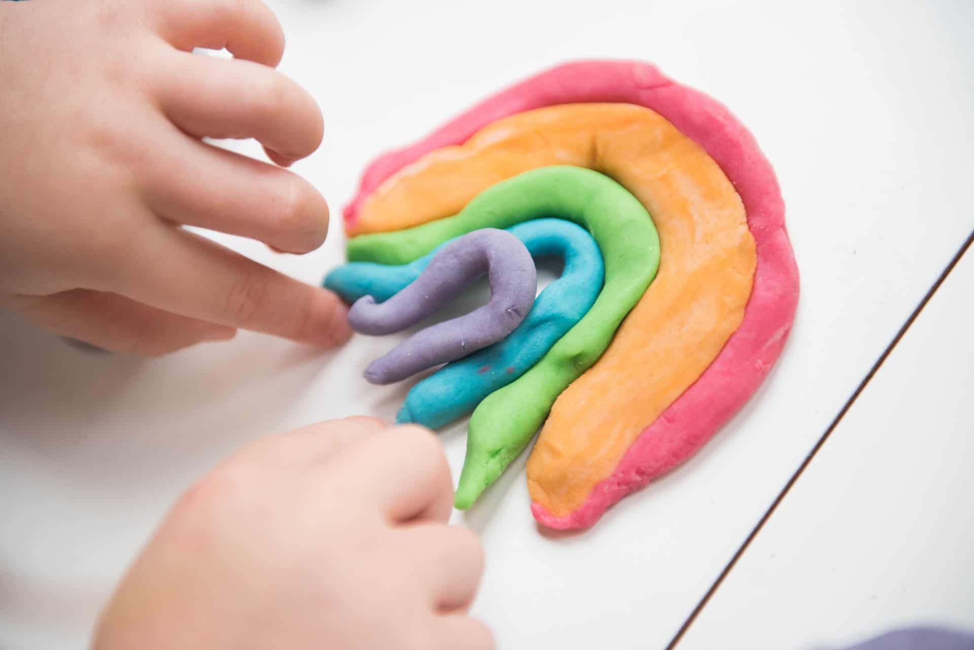 a child playing with play dough