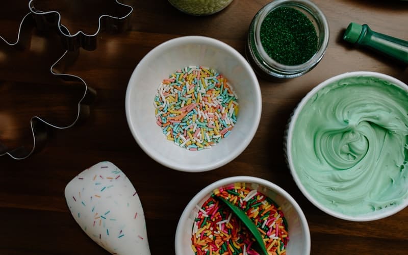 white bowls with sprinkles and frosting