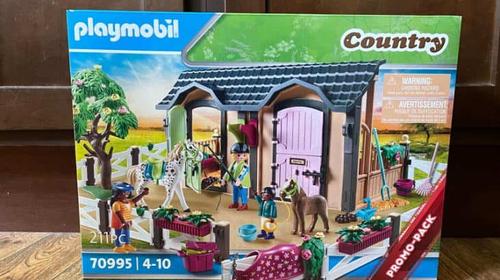 a box containing a Playmobil toy