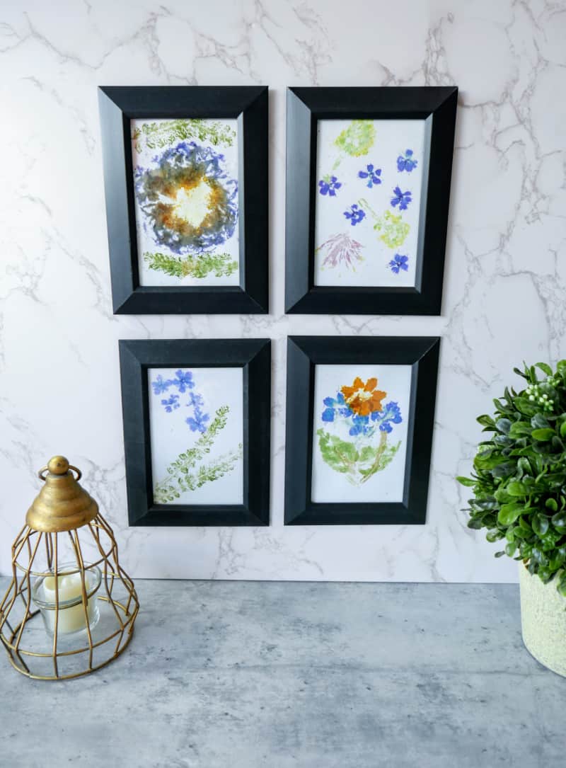 framed flower pounding prints on the wall
