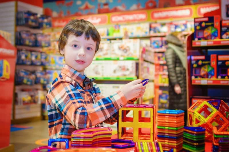 a boy in a toy store