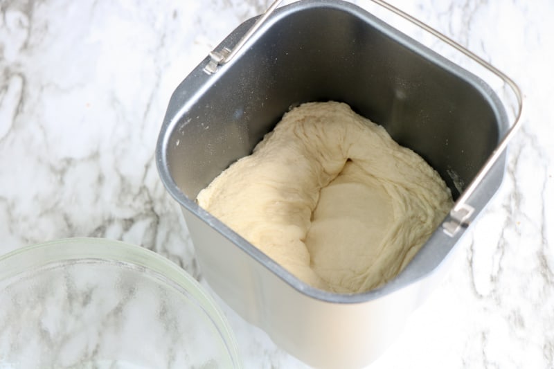 dough in a bread machine pan