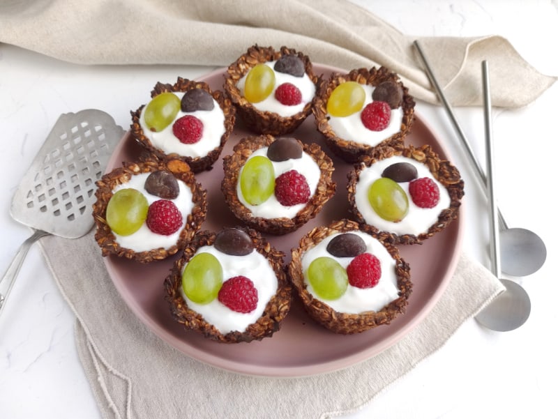 Make this easy mini tartlets recipe featuring whole grains, coconut yogurt, and fresh fruit. Enjoy these mini tarts today.
