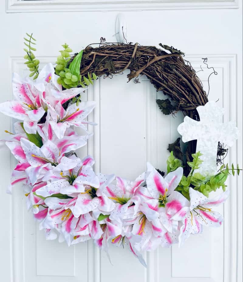 If you're looking for DIY wreath ideas, check out this pink and white door wreath. Whether you need spring wreaths, Easter decor or a wreath that matches your pink Christmas tree, this is it.