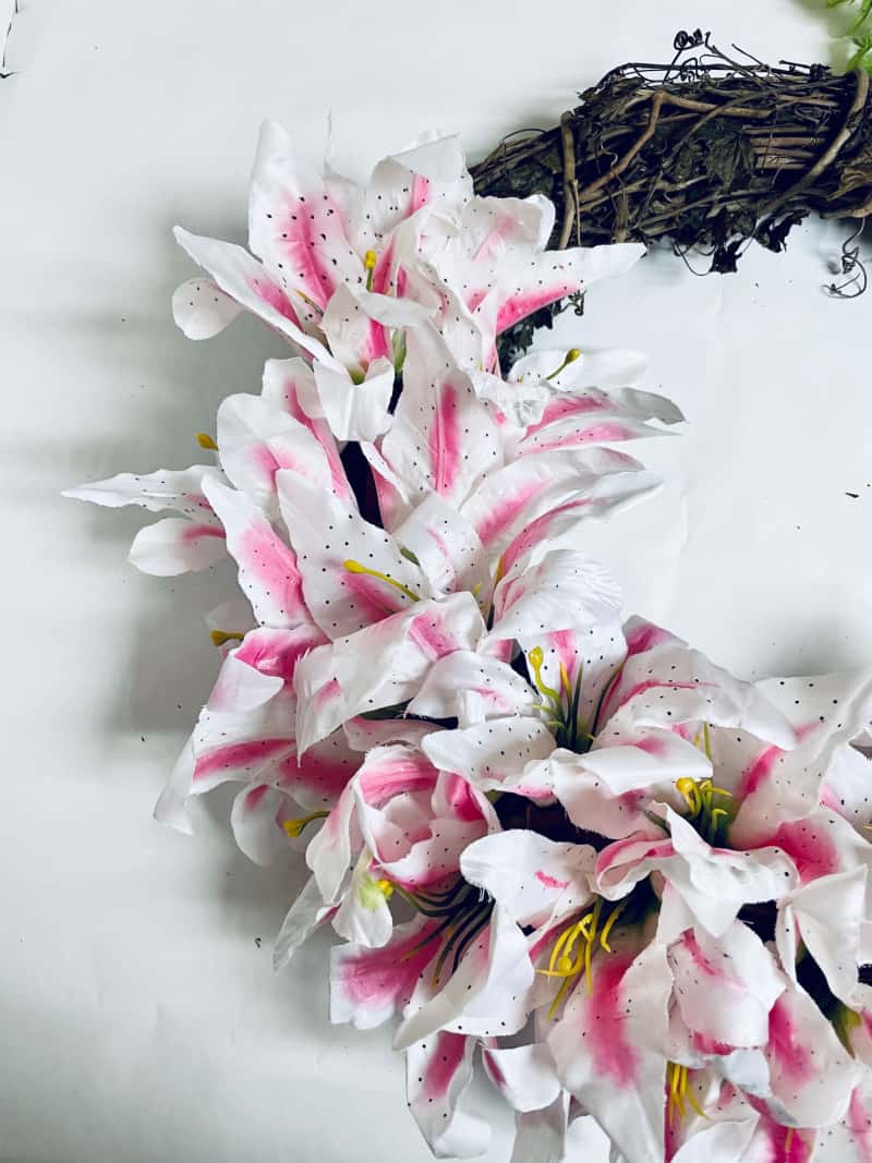 If you're looking for DIY wreath ideas, check out this pink and white door wreath. Whether you need spring wreaths, Easter decor or a wreath that matches your pink Christmas tree, this is it.