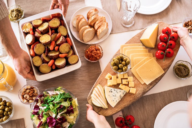 plated food at a potluck party