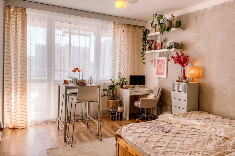 cozy dorm room with large window